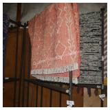 orange area rug (size unknown)