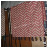 pink area rug  (size unknown)