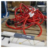 red water hose and solar light