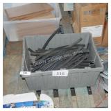 tote of rubber hoses