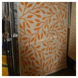 cram/yellow area rug