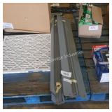 bundle of metal shelving brackets