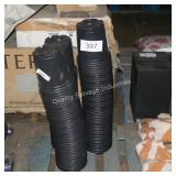 3 stacks of black planters