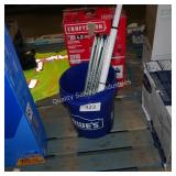 bucket of drawer pulls and closet bar