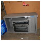 damaged electric fireplace console