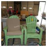 2 green plastic chair w tan cushion
