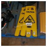 2 wet floor signs