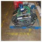 skid of water hoses and sprinklers
