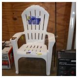 white plastic chair (damage to back)