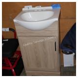 18 vanity w/top (minor damage on rt side)