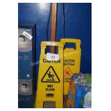 2 wet floor signs