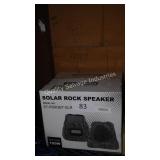 2 solar rock speakers