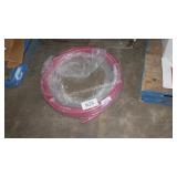 roll of red pipe