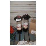 2 bird feeders