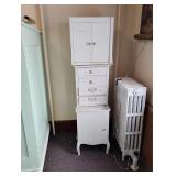 3 small white cabinets