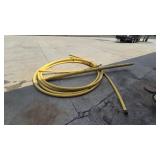 Assorted yellow pipe/tubing and hose sections.
