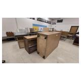Large assortment of wooden cabinets, counters, wor