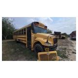 Full-size yellow school bus, unit/bus number 133;