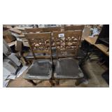 Assorted wooden chairs with lattice backs and padd