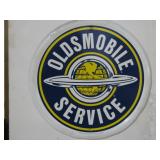 "Oldsmobile Service" Round Metal Sign