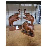 3 wooden elephants
