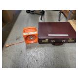 Brief case is locked & portable light