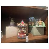 Avon decor items - carousel, hummingbird bell &