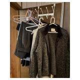 Lot of Womenï¿½s Clothing on Door