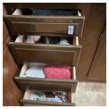 Four drawers various items. Dish towels,