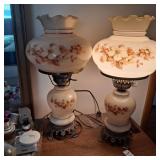 Two hurricane lamps