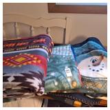 Three fleece blankets