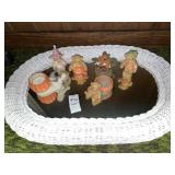 Wicker mirror with fall decor bear figurines