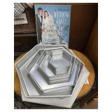 Cake pans and wedding cake book
