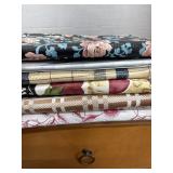 Vinyl tablecloths , misc linen, walker bag