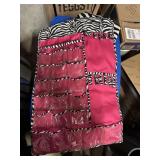 Hanging jewelry organizer and fleece blanket