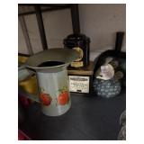Pitcher, tins and decor