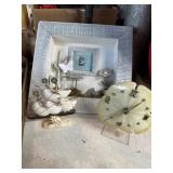 Garden sculpture, shadowbox, seashell clock, and