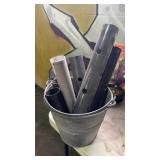Bucket of Metal Pipes