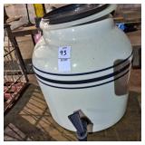 Porcelain or ceramic water crock dispenser.