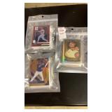 Packs of various baseball cards