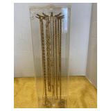 Chain necklaces in lucite necklace holder
