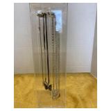Lucite necklace holder with chain and pendant