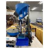 Dillon 1050 Super with bullet case and feeder