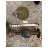 Brass vase and peacock