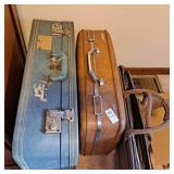 Three Vintage suitcases