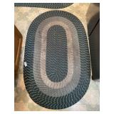 52 & 67 ï¿½ oval braided rugs
