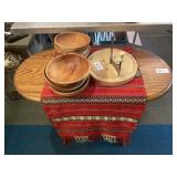 Wooden bowls, cheese cutter, woven table runner