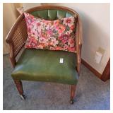 Vintage cane-back barrel armchair with green