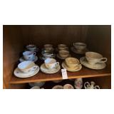 Shelf of Miniature Tea Sets