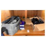 Box of Remotes and Camcorders